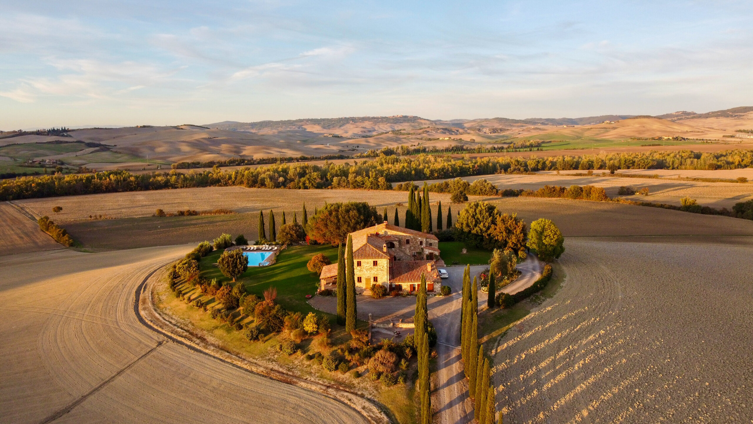 Podere Poggio Covili farmhouse and rolling hills in Tuscany Italy